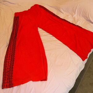 Anthropologie Red Flare Pants with Black Trim